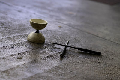 Close-up of equipment on table