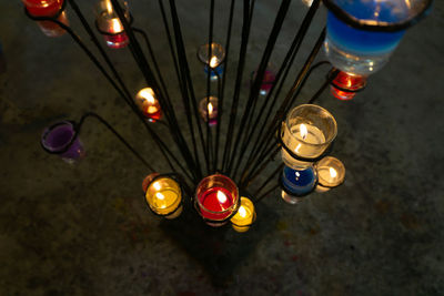 High angle view of light bulbs hanging from ceiling