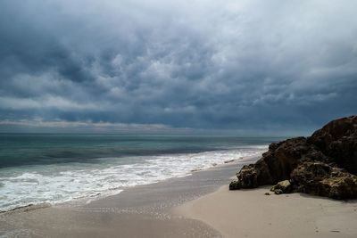 Scenic view of beach against sky