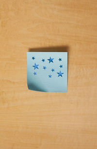 High angle view of paper on table