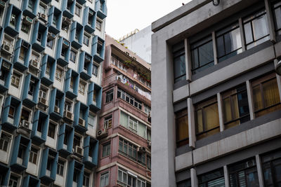 Low angle view of buildings against clear sky