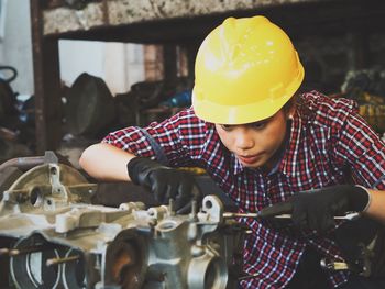 Manual worker working at workshop