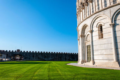 View of historical building against clear blue sky