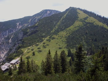 Scenic view of tree mountains against sky