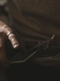 Close-up of hand holding mirror