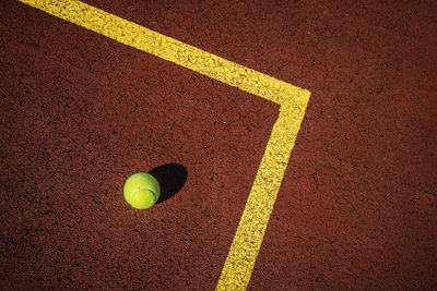 High angle view of tennis ball on field