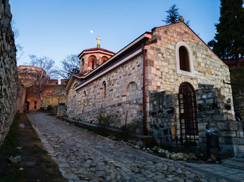 Exterior of old building against sky in city