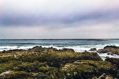 Scenic view of calm sea against sky