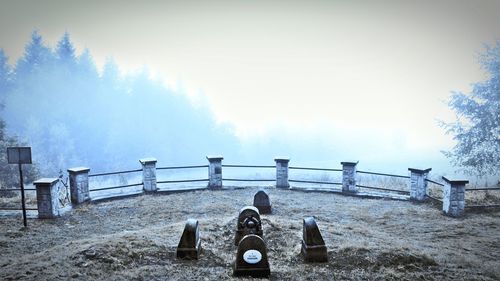 Scenic view of field against sky during winter