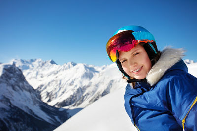 Man skiing on snowcapped mountain