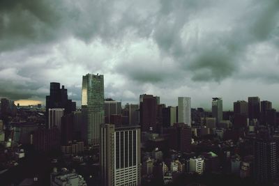 Modern buildings against sky in city