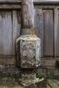 Close-up of carving on stone wall of old building