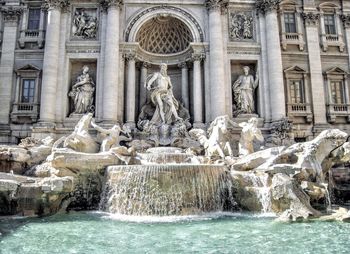 Fountain in front of historical building