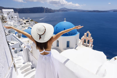 Rear view of woman looking at sea