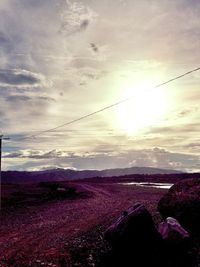 Scenic view of landscape against sky during sunset
