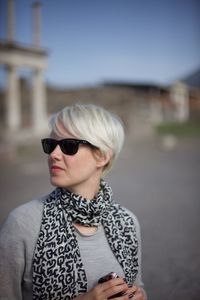 Beautiful woman at pompeii ruins