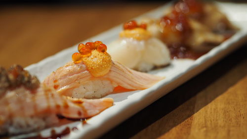 Close-up of sushi in plate on table