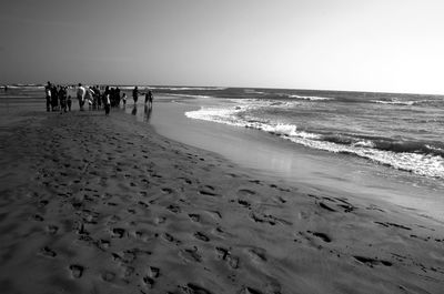 Scenic view of beach against clear sky