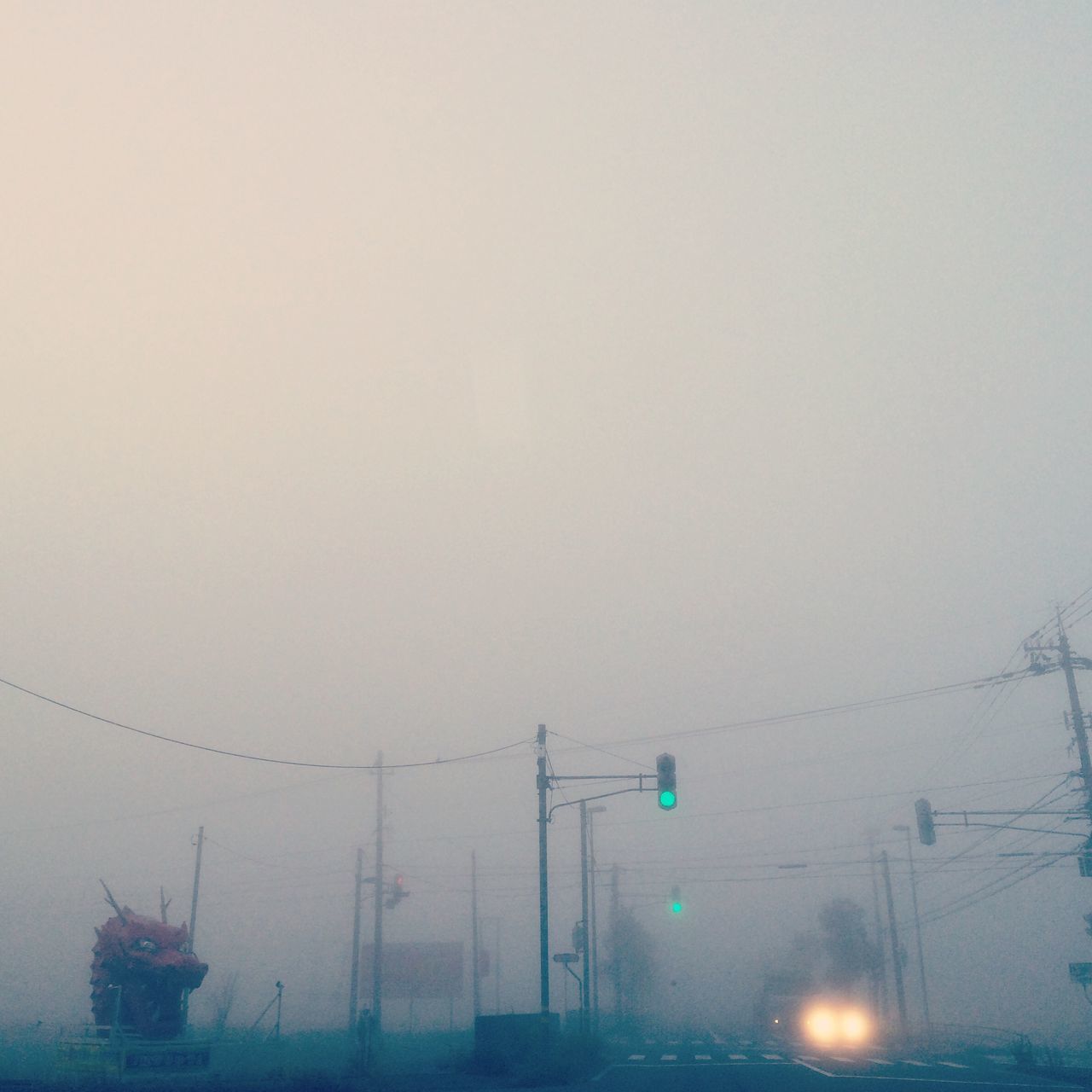 clear sky, copy space, electricity, low angle view, connection, power line, fuel and power generation, electricity pylon, built structure, power supply, technology, sky, transportation, street light, cable, dusk, outdoors, lighting equipment, architecture