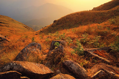 Scenic view of mountains against sky during sunset