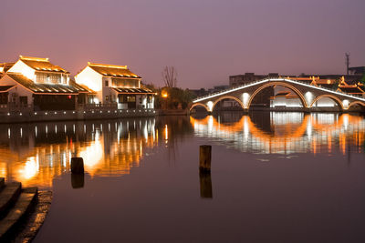 Illumiinated houses and canal at suzhou, jiangsu province, china