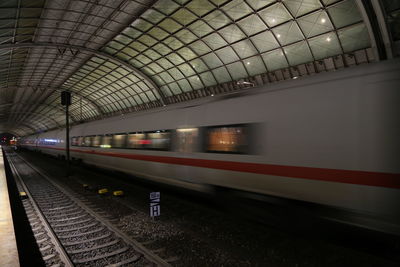 Illuminated railroad station at night