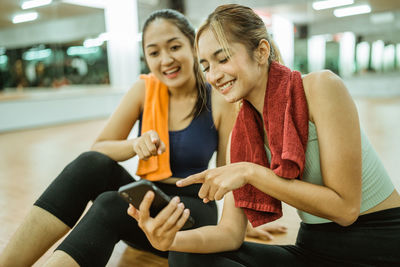 Young woman using mobile phone