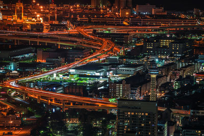 High angle view of illuminated city at night