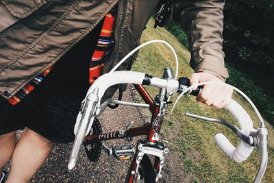 Low section of people riding bicycle