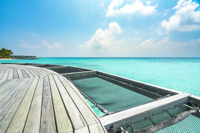 Restaurant floating on sea against sky