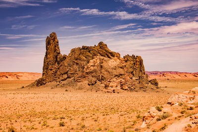 Rock formations in desert against sky