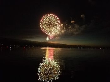 Firework display at night