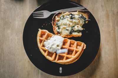 High angle view of breakfast in plate on table