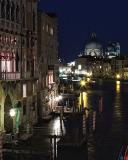 Illuminated buildings in city at night