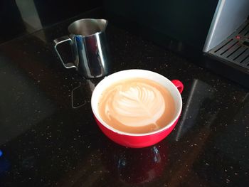 High angle view of coffee cup on table