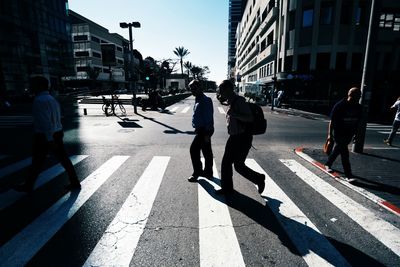 People walking on city street