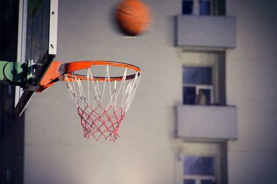 Low angle view of basketball hoop against sky