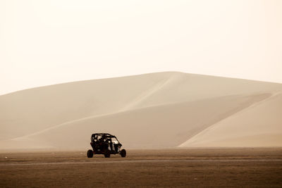 Scenic view of desert against sky