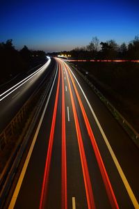 Long exposure of vehicle on road at night