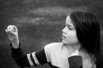 Close-up of girl looking at something