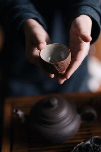 Midsection of man preparing food