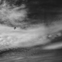 Airplane flying over sea