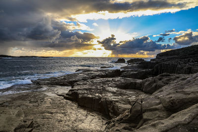 Scenic view of sea against sky during sunset