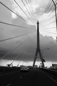 View of bridge against cloudy sky