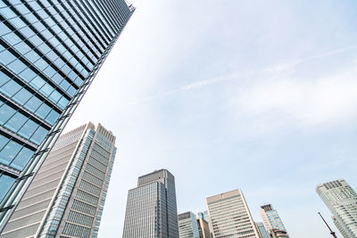 Low angle view of modern buildings against sky