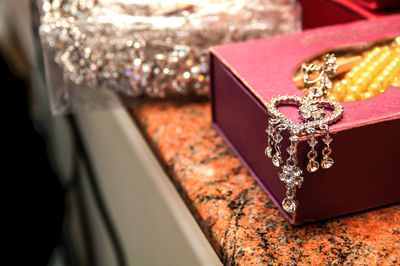 Close-up of jewelry on box