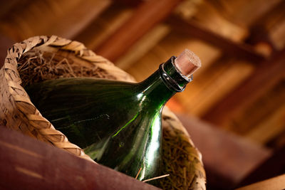 Close-up of water bottle on a cellar