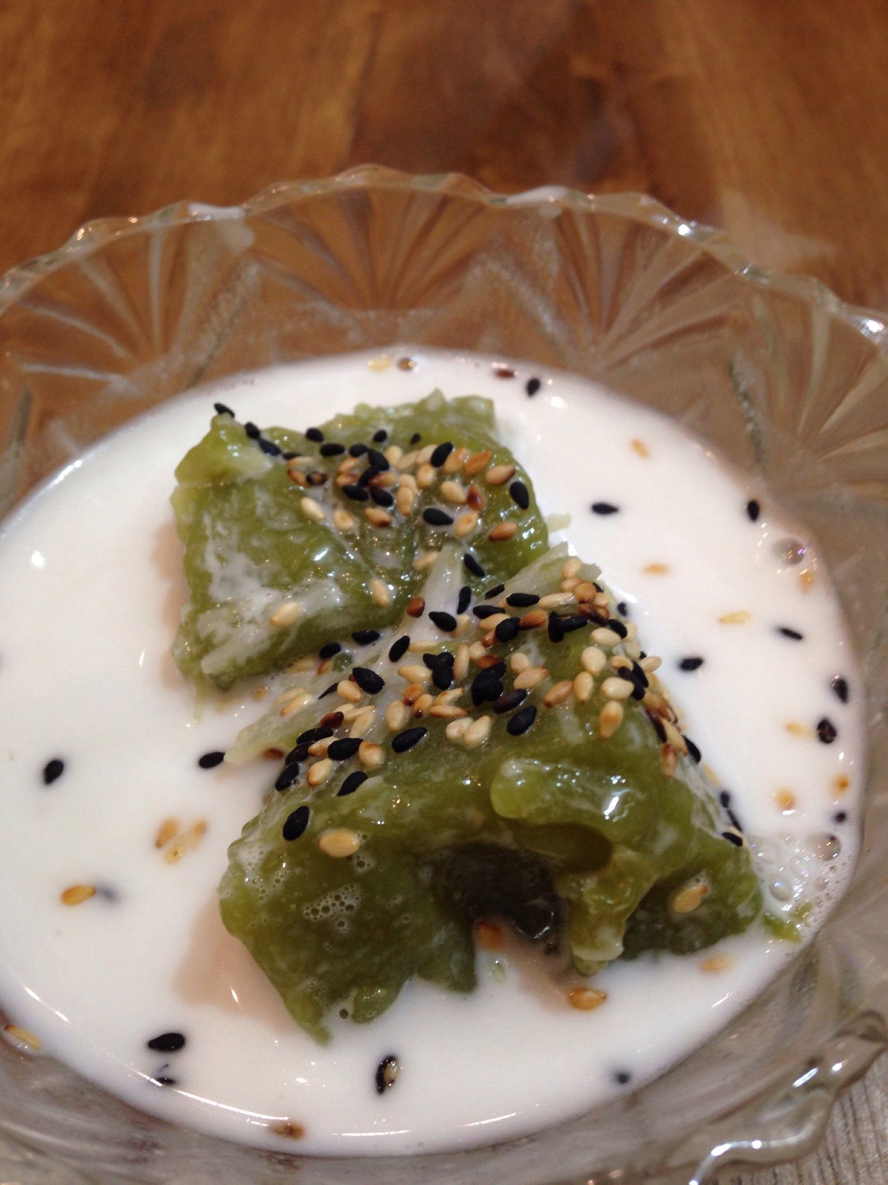 Green coconut pudding with coconut milk