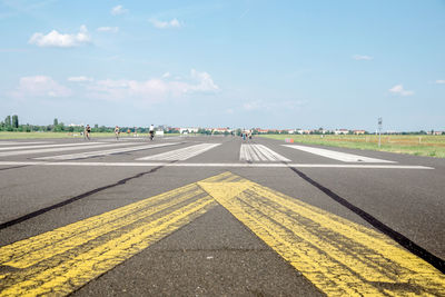 People on airport runway