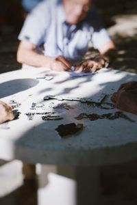 My grandfather playing dominó 